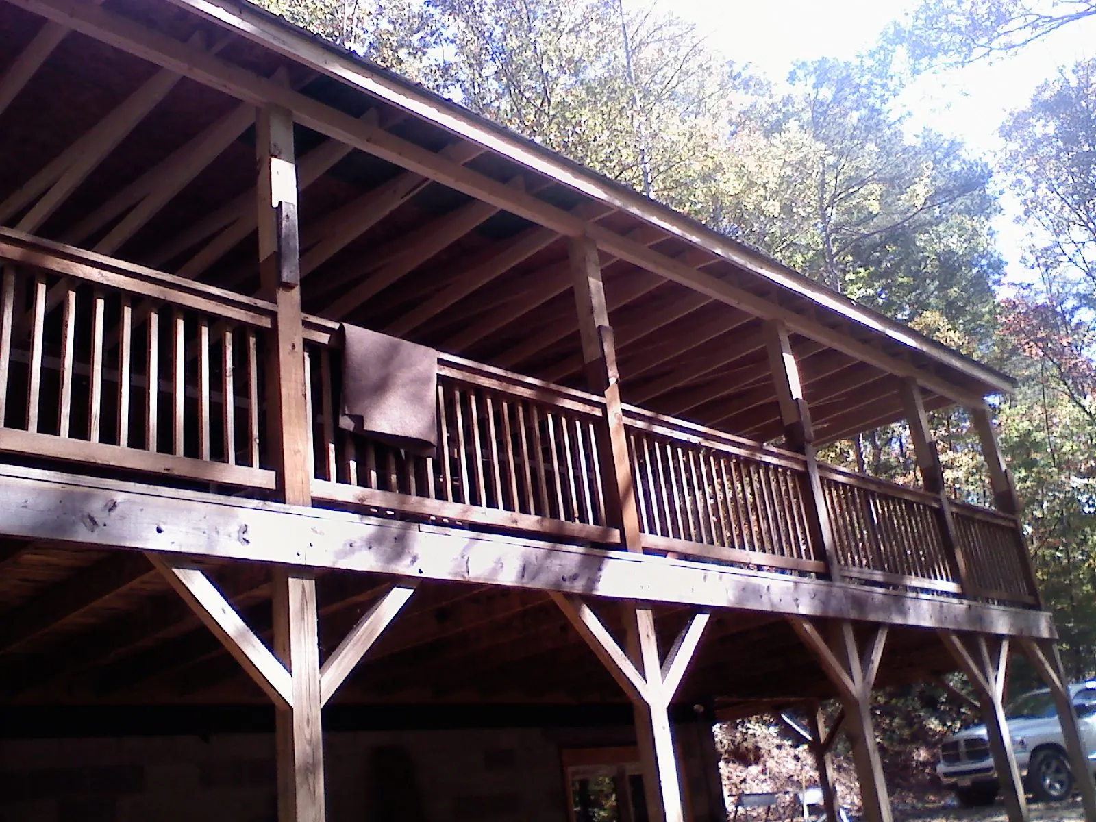 Timber framing under a new elevated porch and deck — Roof Leak Repair in Denhoff by Roofing Brothers